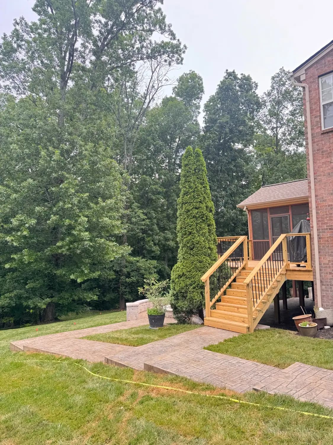 Paver walkway with a retaining seat wall
